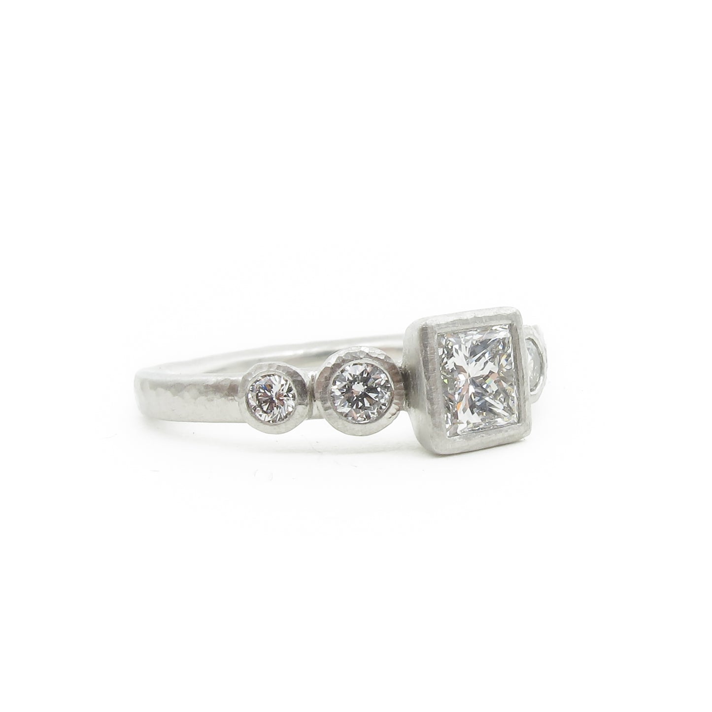 Bezel set diamond five stone ring