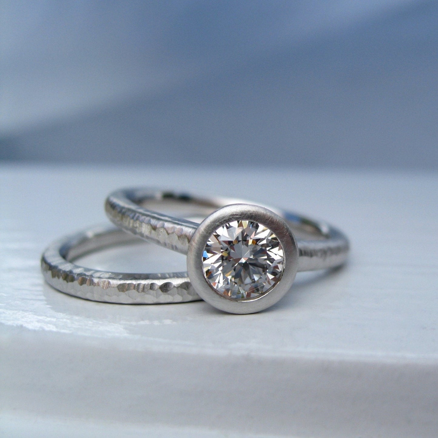Platinum and Diamond bezel set engagement ring, Pacific Ring engagement and band set