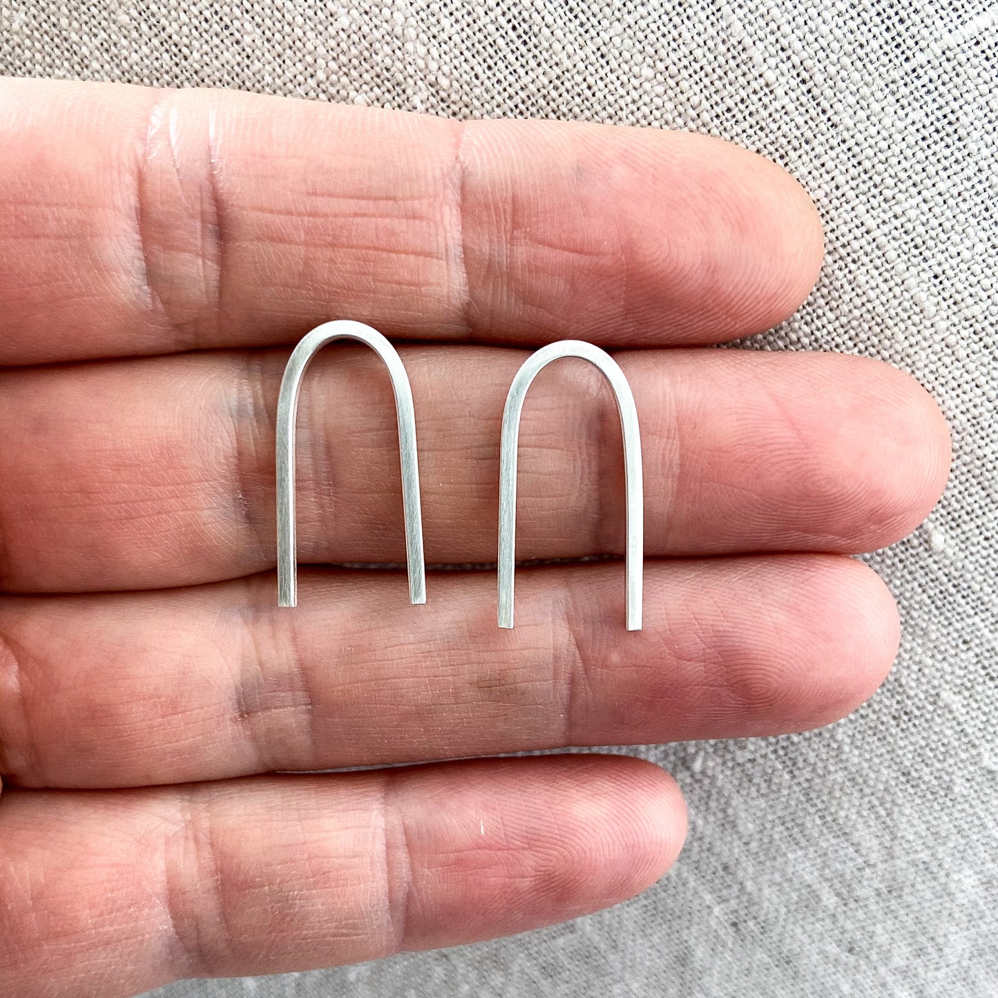 Sterling silver U earrings