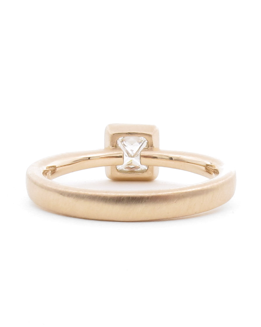 Back view of open bezel engagement ring