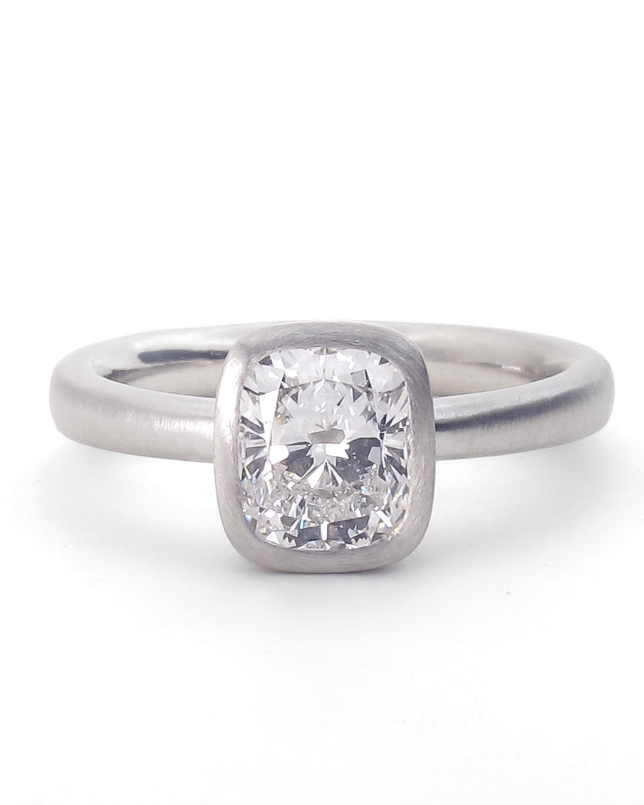Cushion cut diamond bezel ring