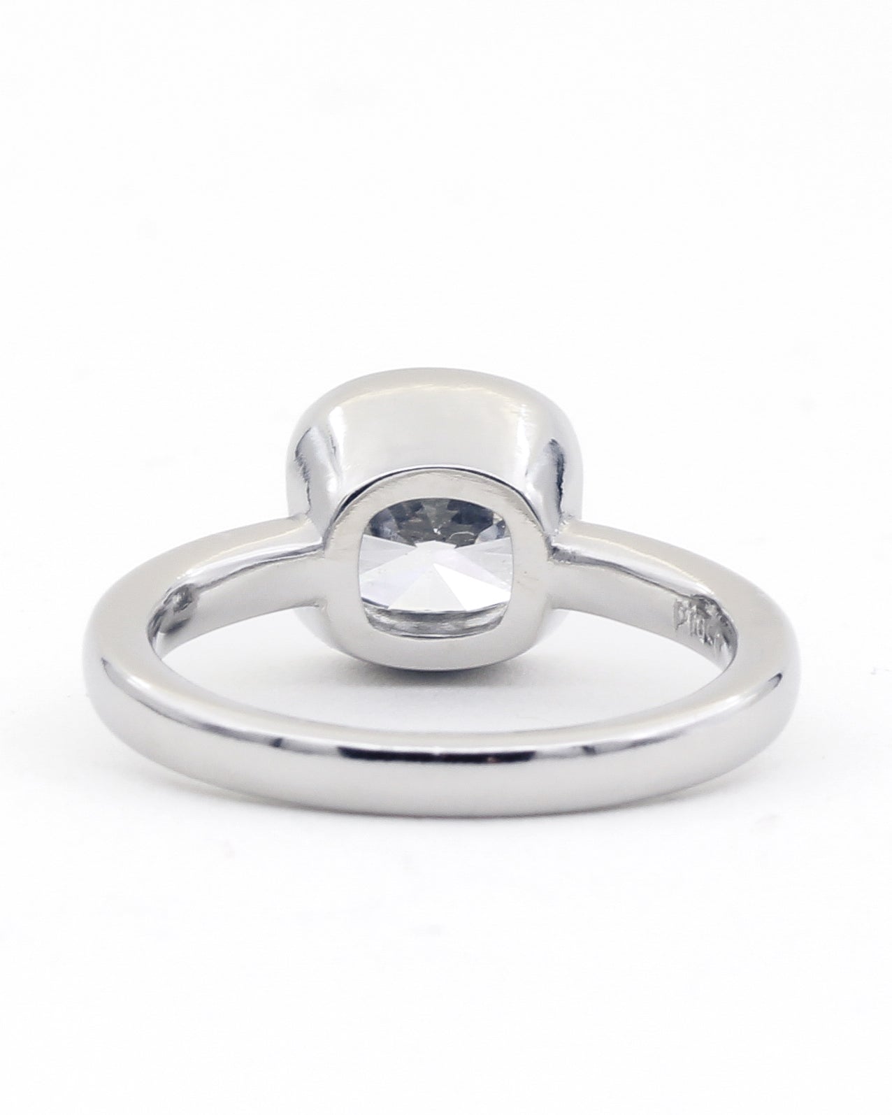 Back view of a platinum and diamond bezel ring