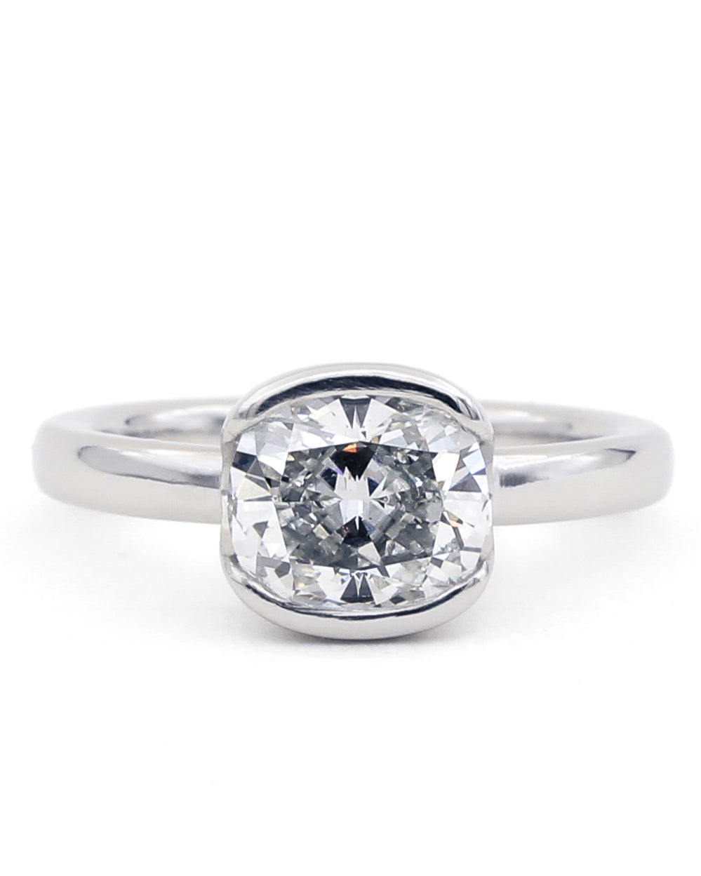 Half bezel diamond engagement ring