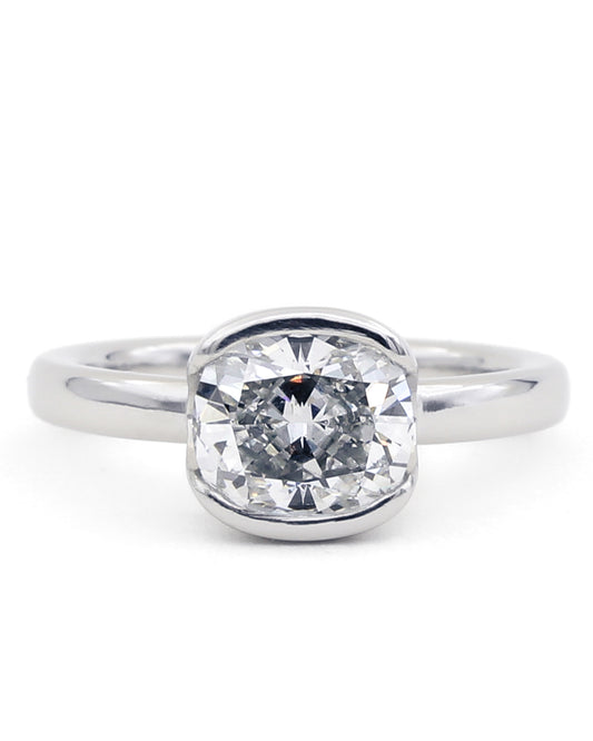 Half bezel diamond engagement ring
