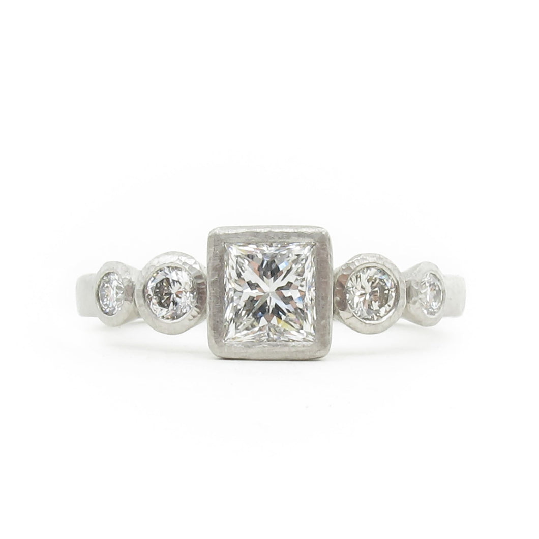 Bezel set diamond five stone ring