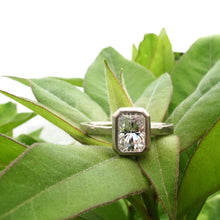 Load image into Gallery viewer, Low profile emerald cut moissanite engagement ring