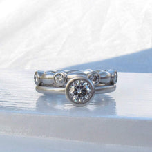 Load image into Gallery viewer, Classic bezel diamond ring with matching platinum and diamond eternity ring