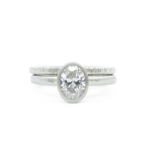 Oval diamond and platinum ring with slender bands, Oval Pacific Ring